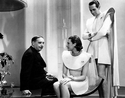 H.G. Wells, Ann Todd and Raymond Massey on the set of 'Things to Come' (1936)